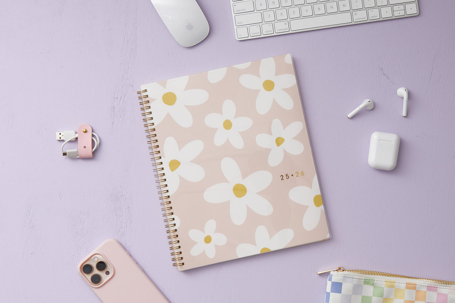 2025-2026 weekly monthly planner featuring a daisy and pink front cover.