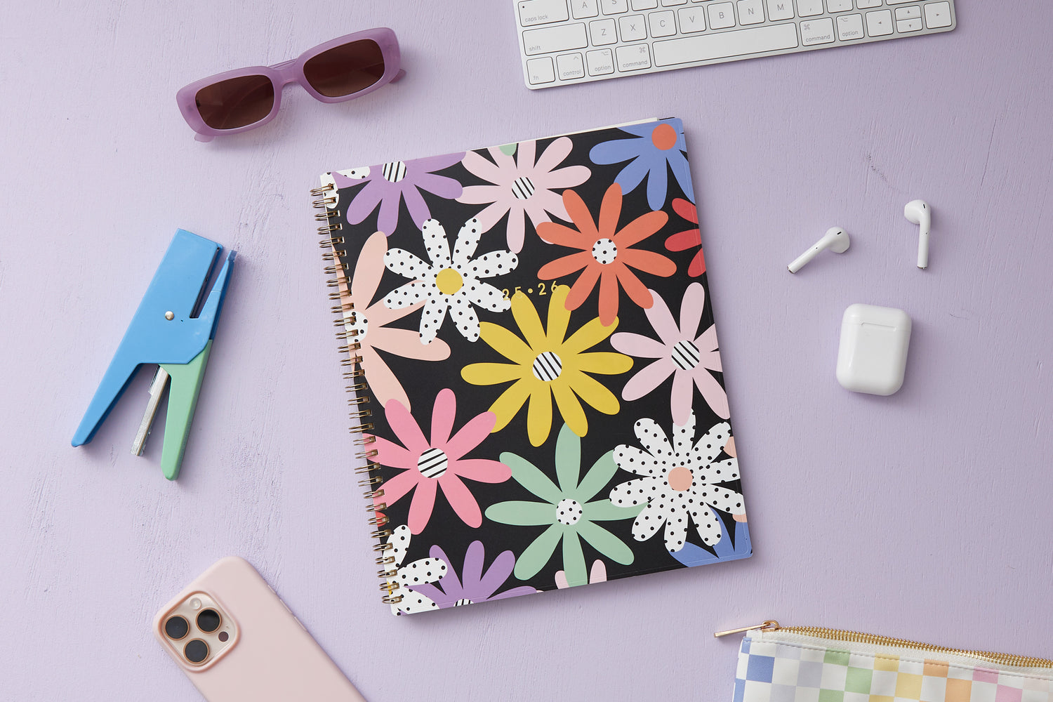 2025-2026 weekly monthly planner featuring a daisy and back front cover. 8.5x11