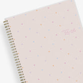 small confetti and blush front cover on this 2025-2026 student lesson planner