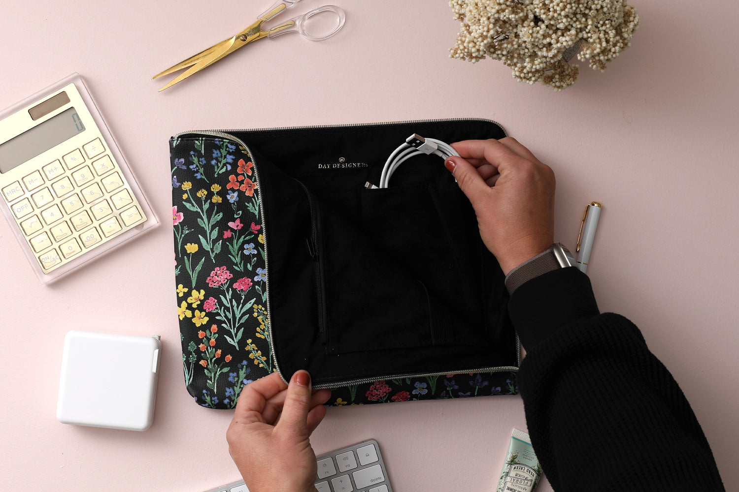 8x10 floral accessory pouch with a zipper enclosure fits cables, phones, and external batteries.