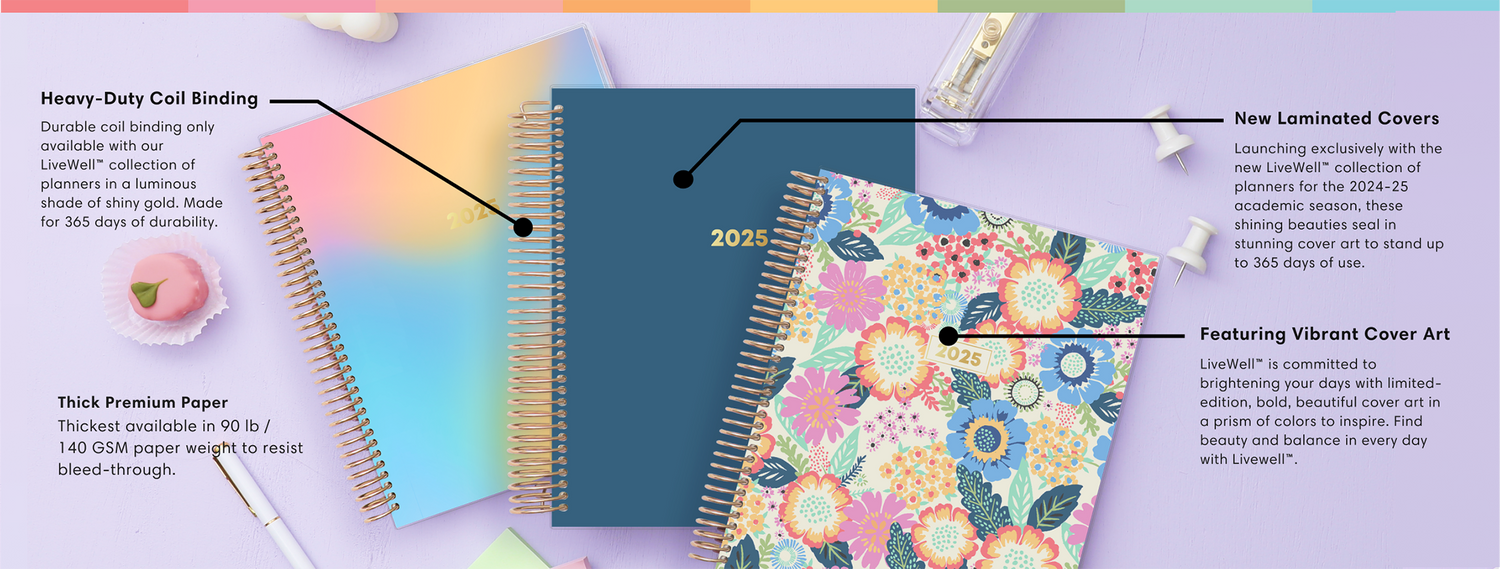 2025 LiveWell planners in 3 different patterns: a rainbow gradient, a dark blue solid cover, and a floral cover on a deskcape